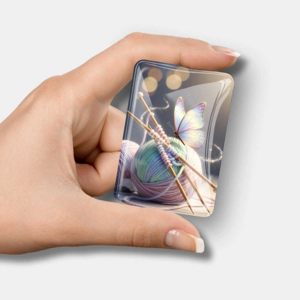 Magischer Cover Minder mit Wollknäuel- und Schmetterlingsmotiv als praktisches Zubehör für dein Diamond Painting Set