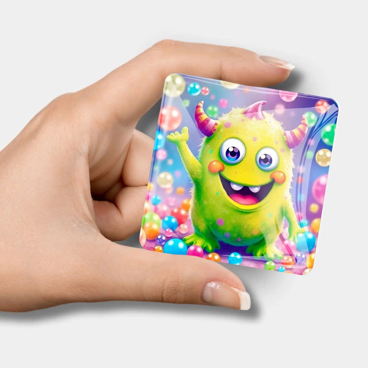 Quadratischer Glas-Cover Minder mit süßem Monster-Motiv als praktisches Zubehör für dein Diamond Painting Set