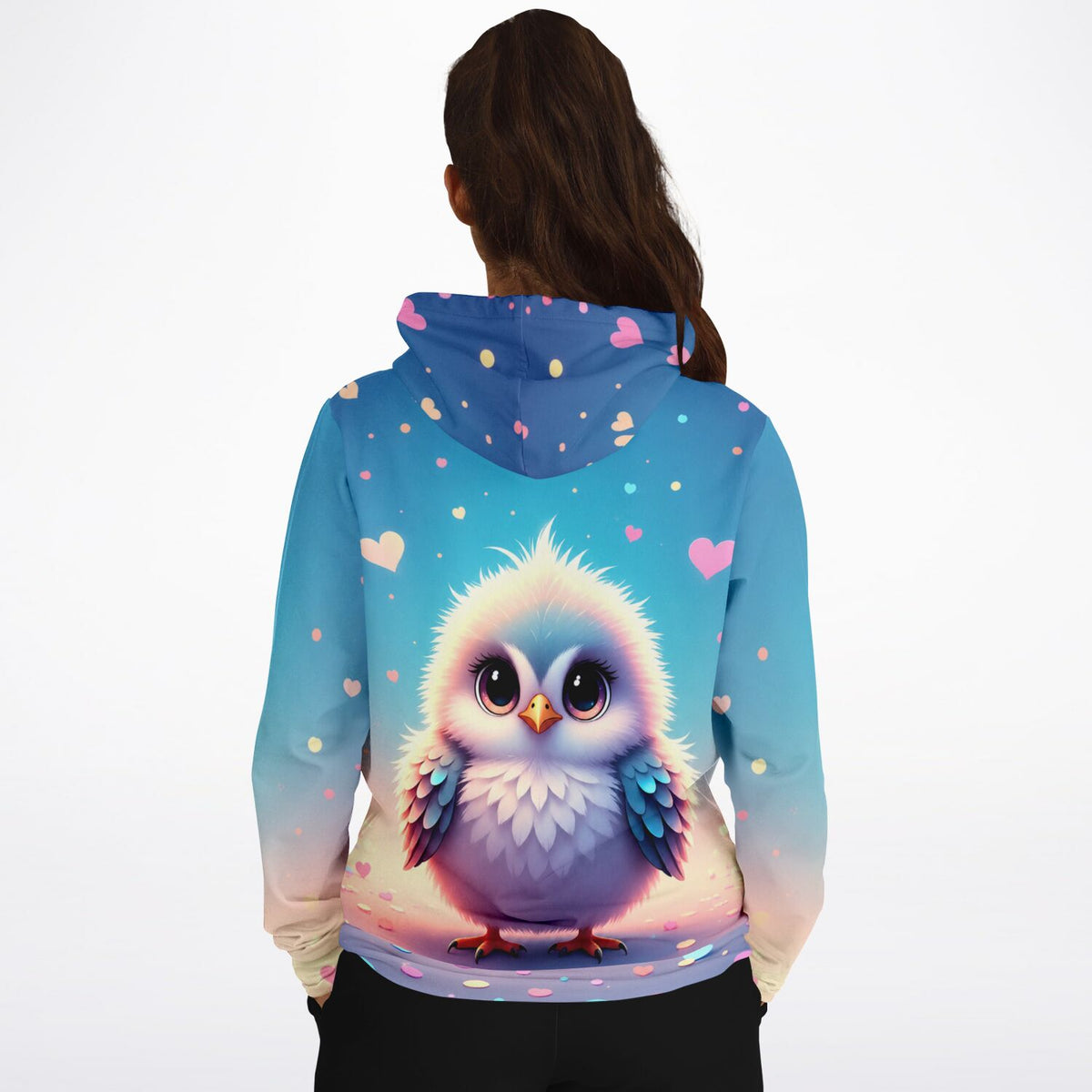 Dreamer Hoodie mit niedlichem Vogel-Motiv und Herz-Design in Pastellfarben auf blauem Hintergrund