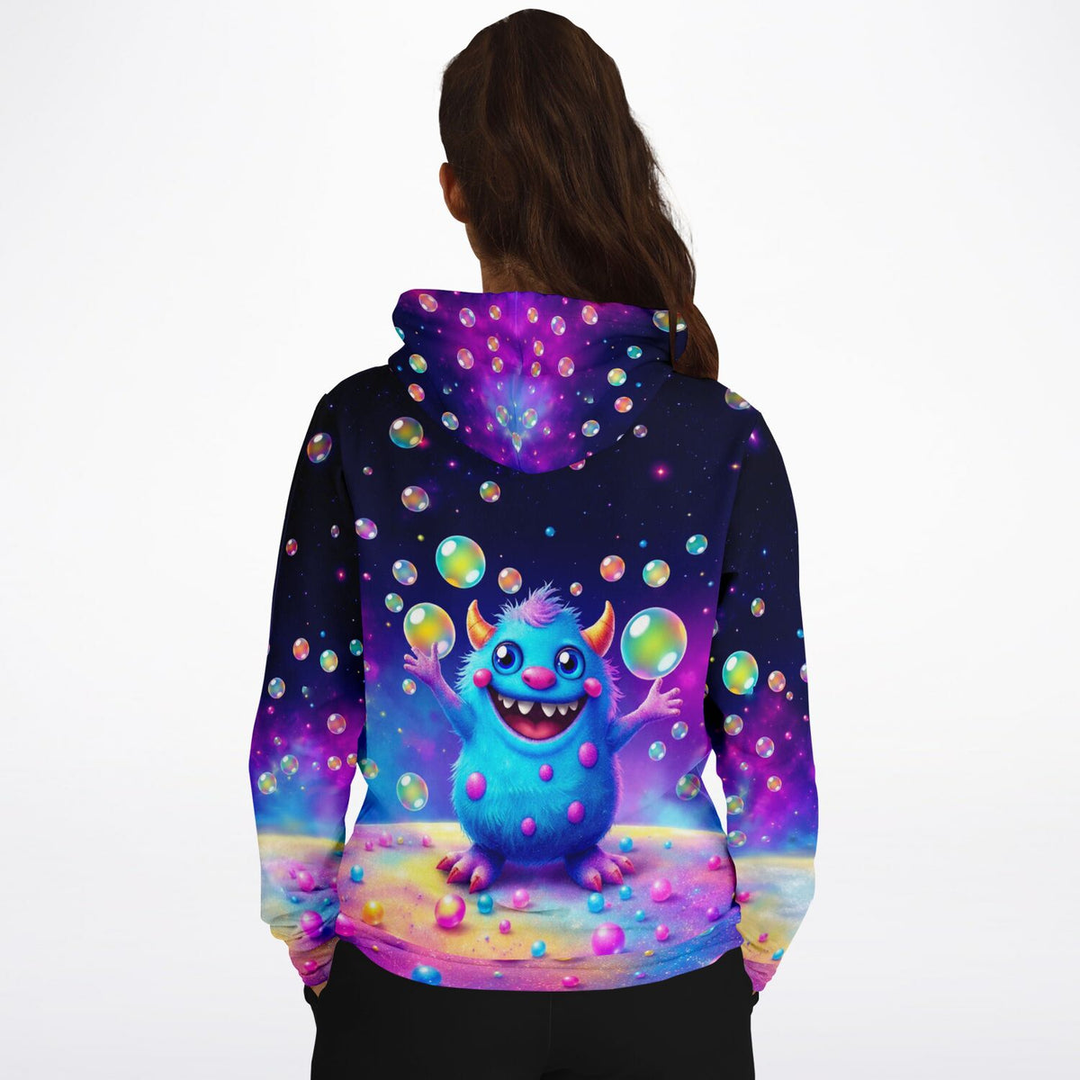Dreamer Hoodie mit buntem Monster-Motiv, lila Galaxie-Hintergrund und schwebenden Seifenblasen im AOP-Design