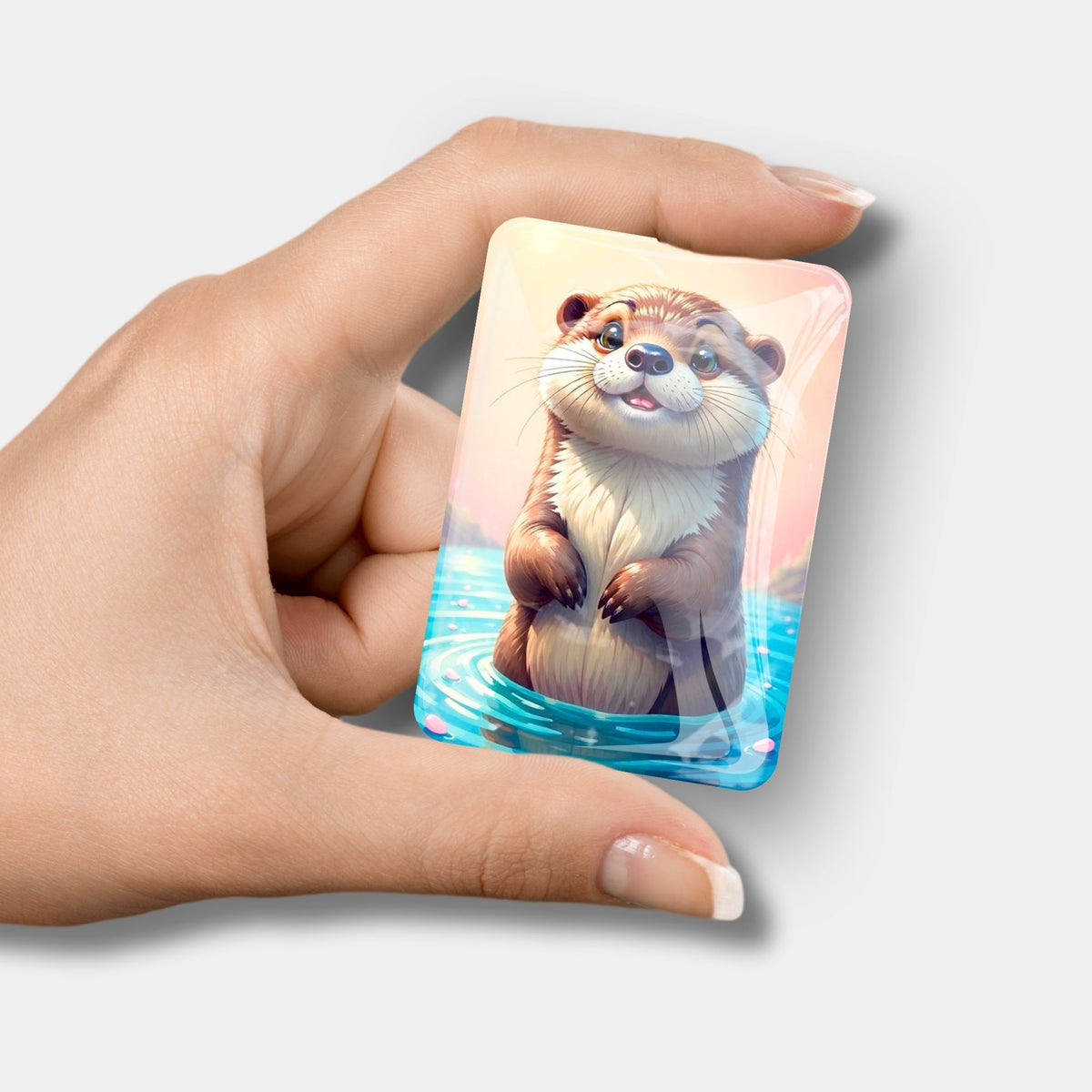 Glas Cover Minder mit süßem Otter-Motiv als praktisches Diamond Painting Zubehör zum Fixieren der Schutzfolie.