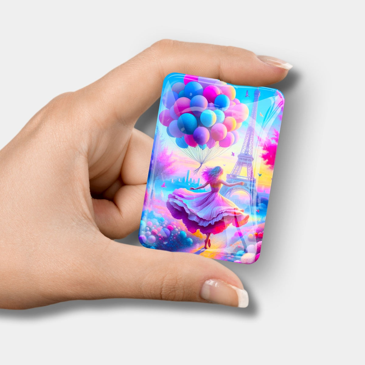 Diamond Painting Cover Minder mit Paris Motiv, tanzendem Mädchen und Luftballons vor dem Eiffelturm als Bastelzubehör