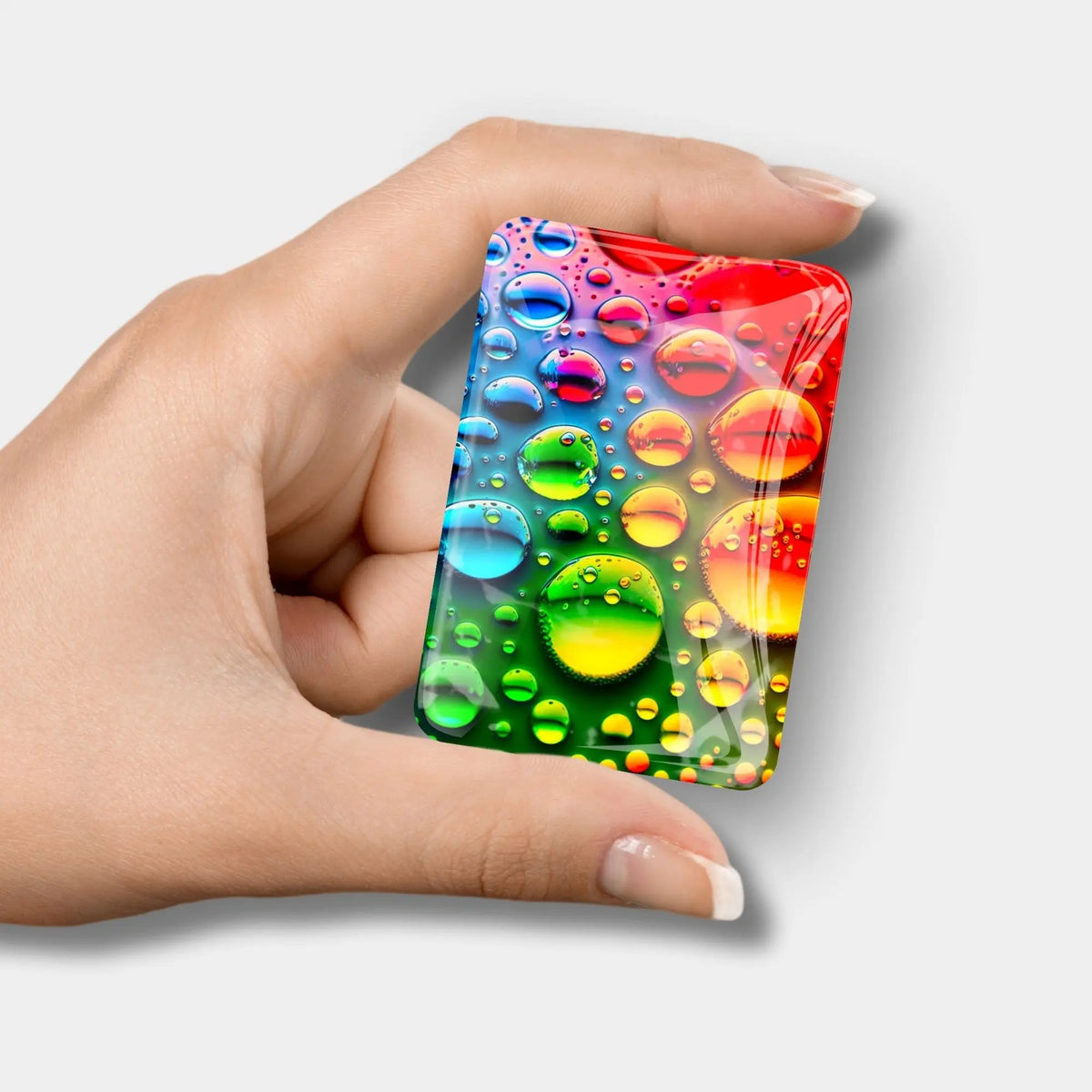 Bunter Cover Minder mit farbenfrohem Wassertropfen-Motiv als praktisches Zubehör für Diamond Painting Projekte