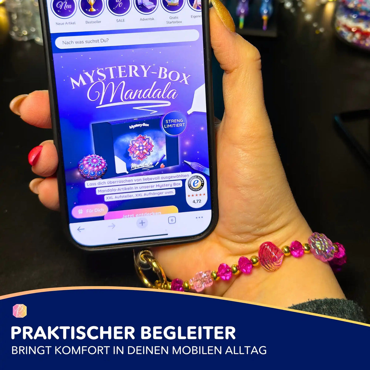 Stylische Handykette mit pinken Perlen am Smartphone, das die Picmondoo Mystery-Box für Diamond Painting Mandala anzeigt