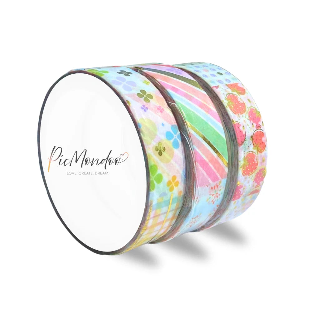 Drei bunte Washi-Tape Rollen als Diamond Painting Zubehör für gerade Steinreihen und saubere Ränder