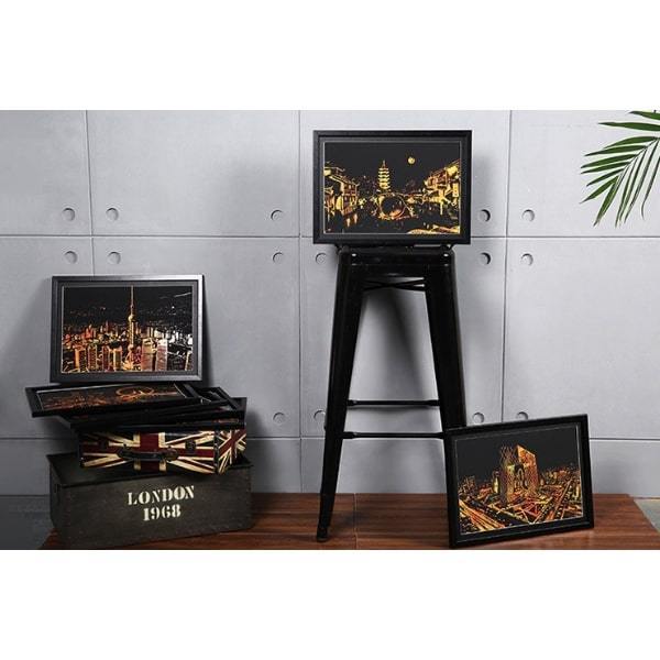 XL Scratch Painting 4er Set mit golden leuchtenden Stadtmotiven in schwarzen Bilderrahmen als DIY-Wanddeko