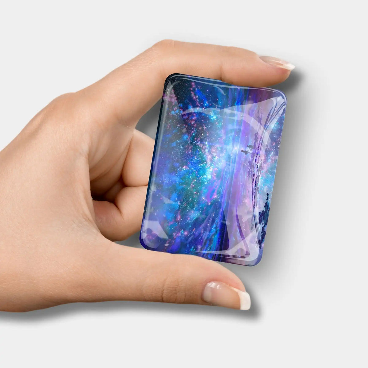 Magischer Cover Minder mit Ozean-Universum-Motiv für Diamond Painting Zubehör in der Hand gehalten