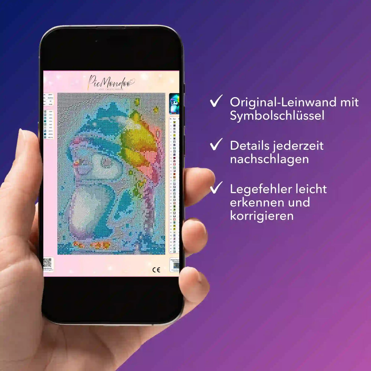 Smartphone mit digitaler Diamond Painting Bildmappe vom Pinguin-Motiv zur Hilfe beim Legen der Diamanten
