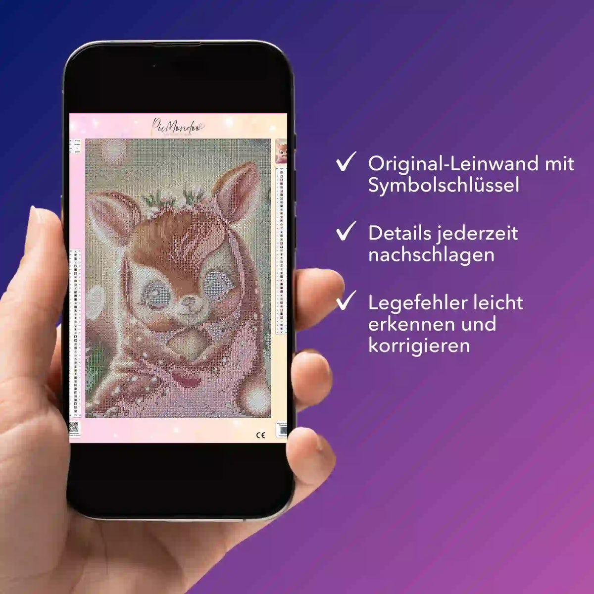 Digitale Diamond Painting Bildmappe für das Motiv Rehkitz auf einem Smartphone betrachtet.