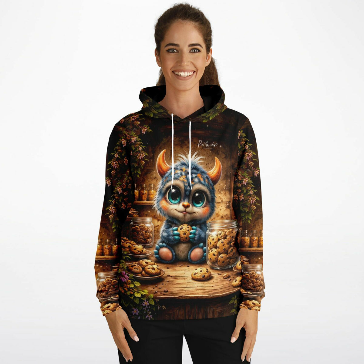 Frau trägt Hoodie mit niedlichem Monster-Motiv und Keks-Thema, inspirierend wie Malen nach Zahlen oder Diamond Painting.