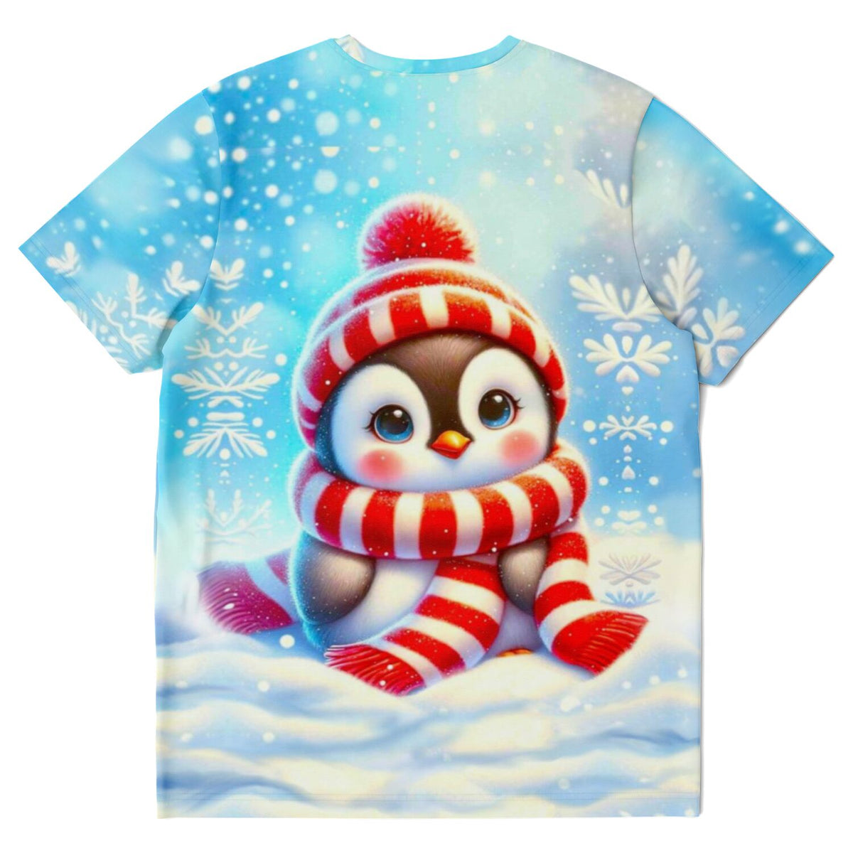 T-Shirt mit süßem Pinguin Pixie in rot-weißem Schal und Mütze im Schneegestöber, passend zu winterlichen Bastelmotiven
