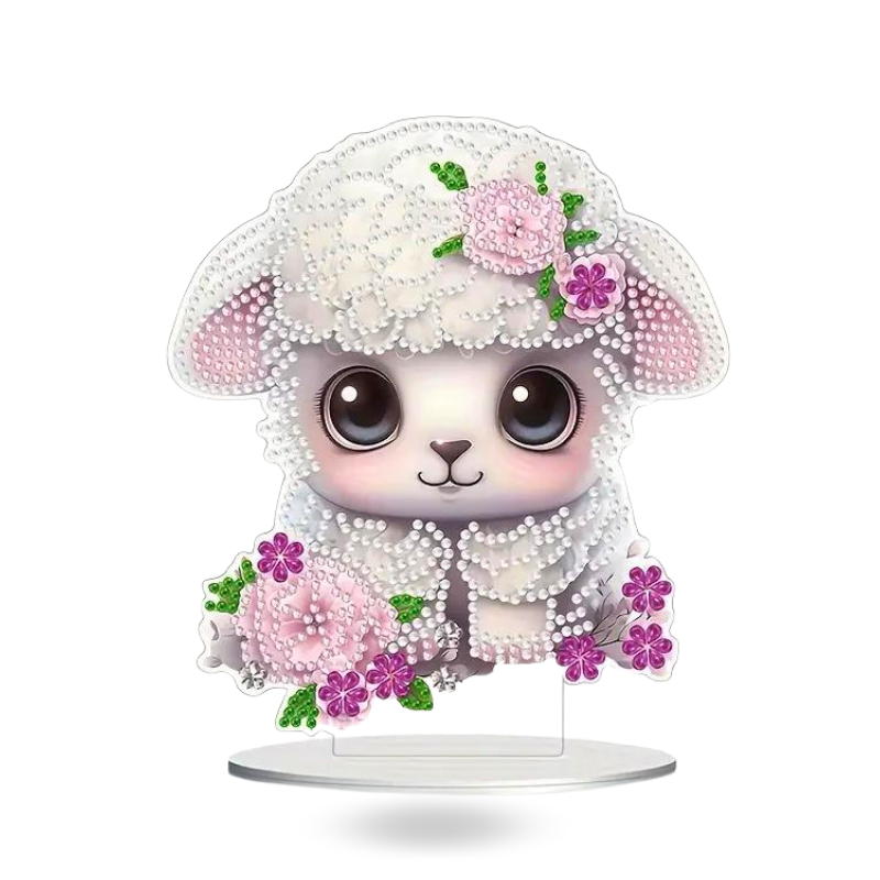 Diamond Painting Aufsteller Sweet Sheep: Ein süßes Schaf mit rosafarbenen Blumen, verziert mit glitzernden Diamanten.