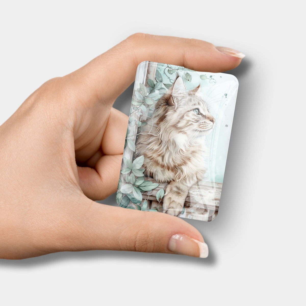 Kater Cosimo Glas-Coverminder für Diamond Painting Zubehör mit Katzen-Motiv in der Hand gehalten