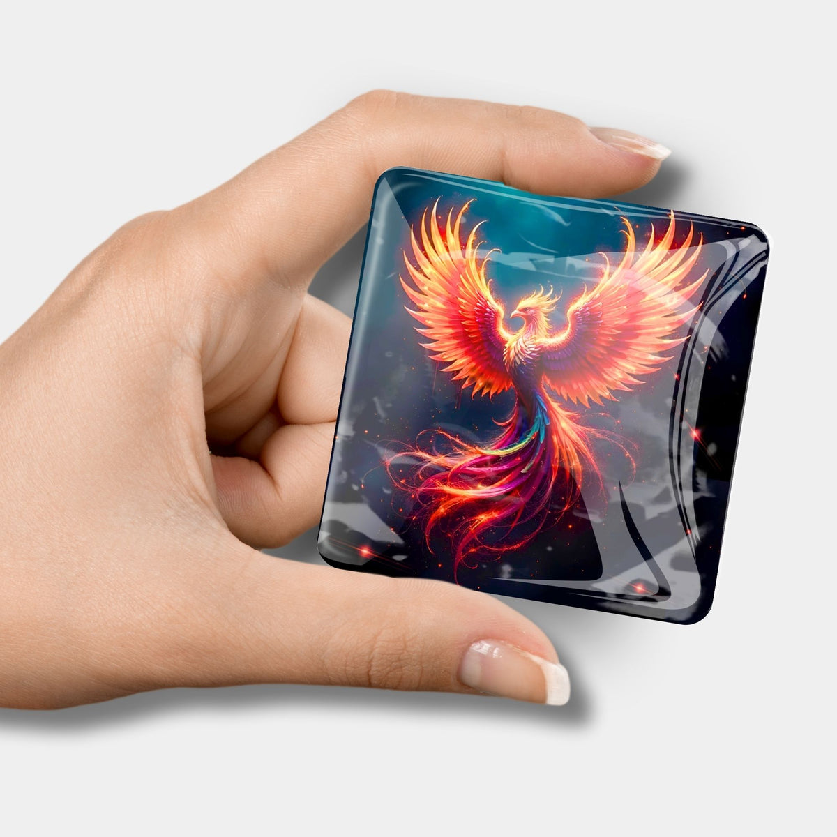 Phönix-Coverminder aus Glas als praktisches Zubehör für Diamond Painting und Bastelprojekte in der Hand gehalten