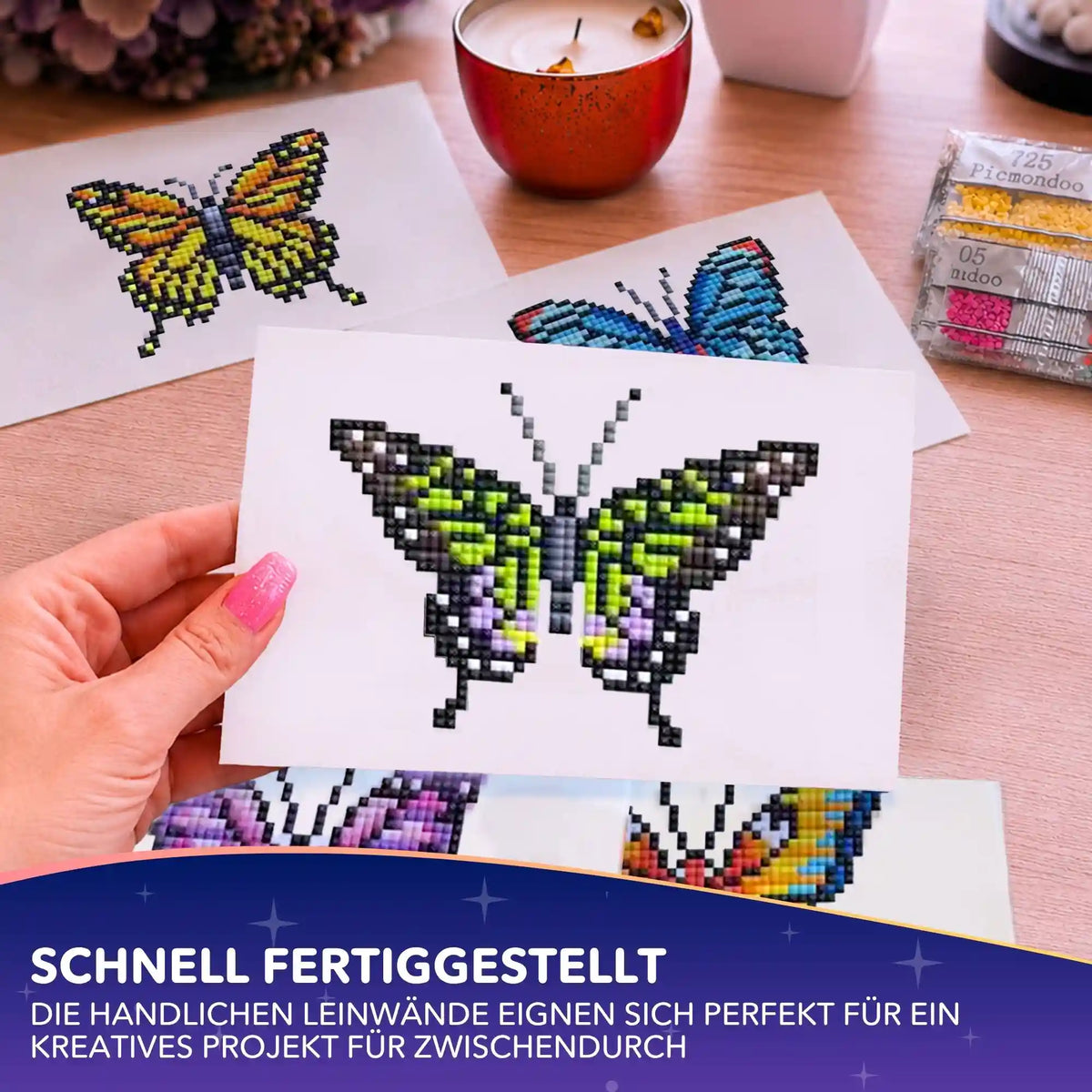 Diamond Painting Mini Set mit bunten Schmetterling-Motiven auf kleinen Leinwänden als kreatives DIY-Bastelprojekt.