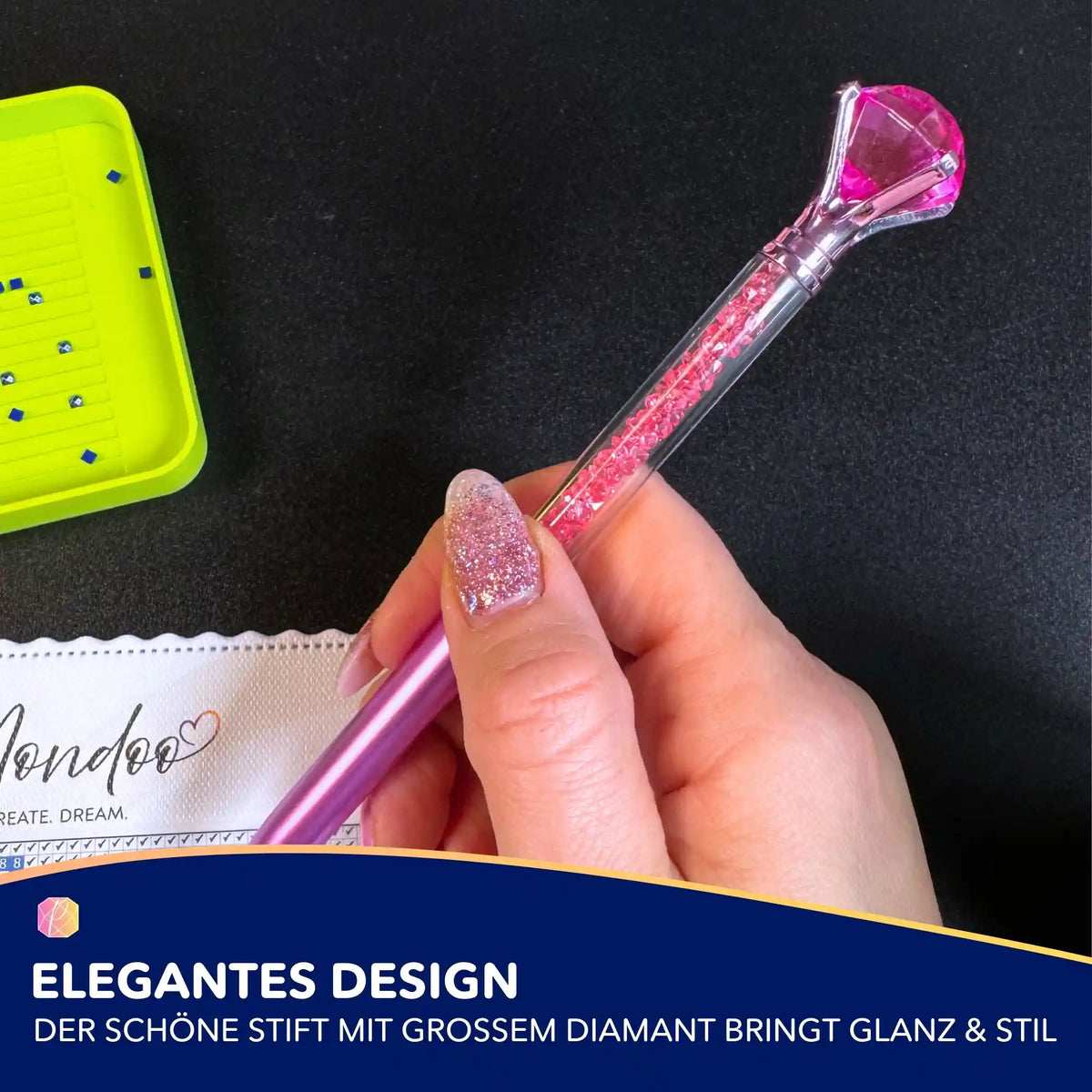 Rosa Diamond Painting Stift mit großem Diamant als Verzierung, ideal als Zubehör für Diamond Painting Sets.