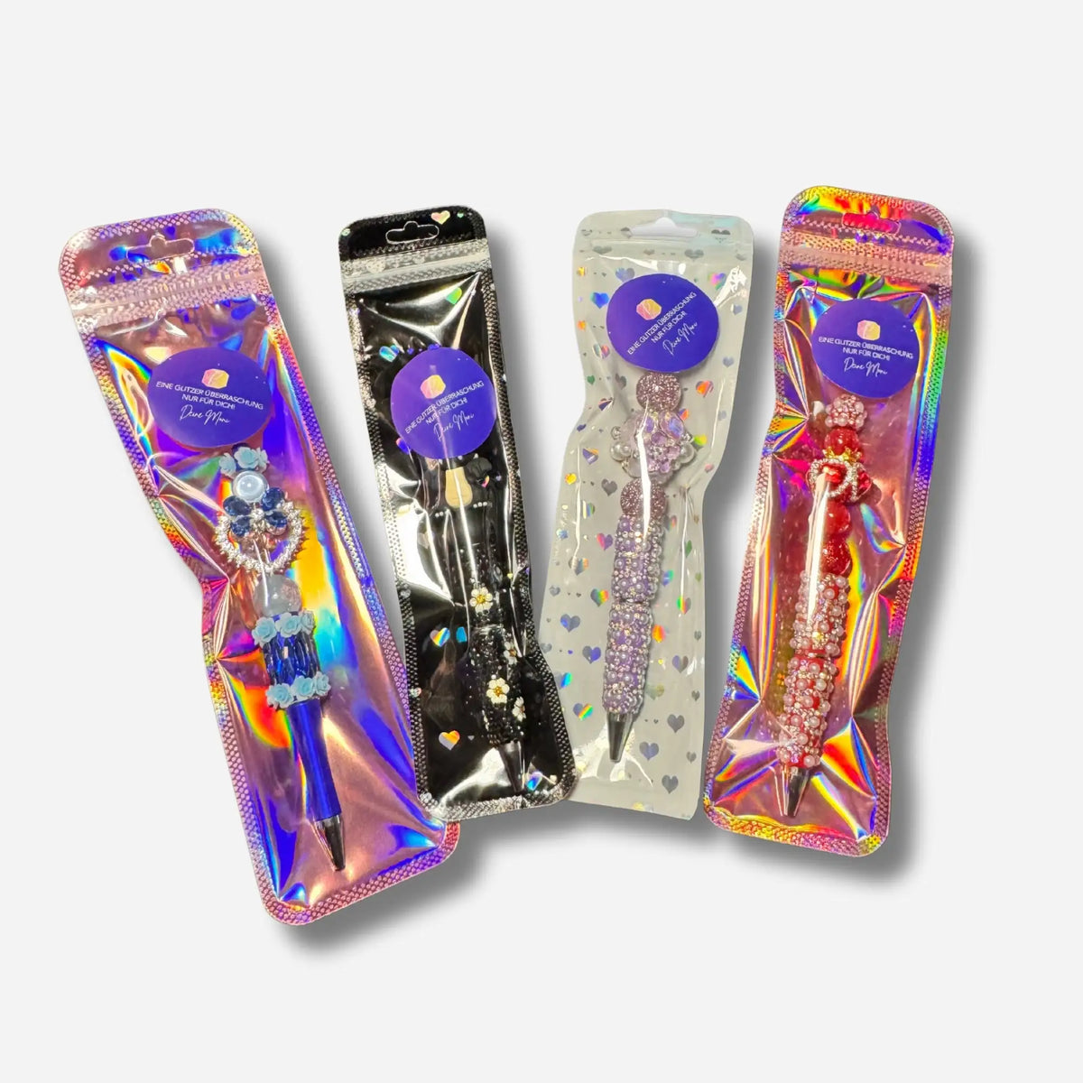 Handgefertigter Diamond Painting Stift von Moni in holografischer Verpackung, ideal als Zubehör für bastelbegeisterte Kreative.